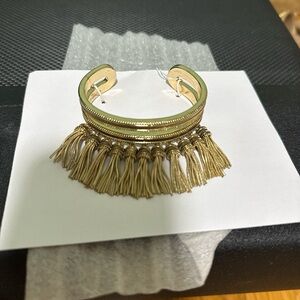 NWT bcbg generation Elegant and fun Gold Tassel Cuff Bracelet